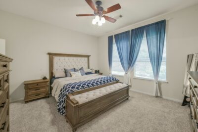 Primary bedroom with ample natural light