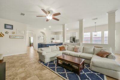 Comfortable living area featuring abundant natural light and modern finishes.