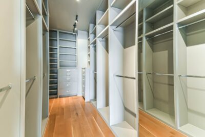 Dream walk-in closet with extensive custom built-in organization.